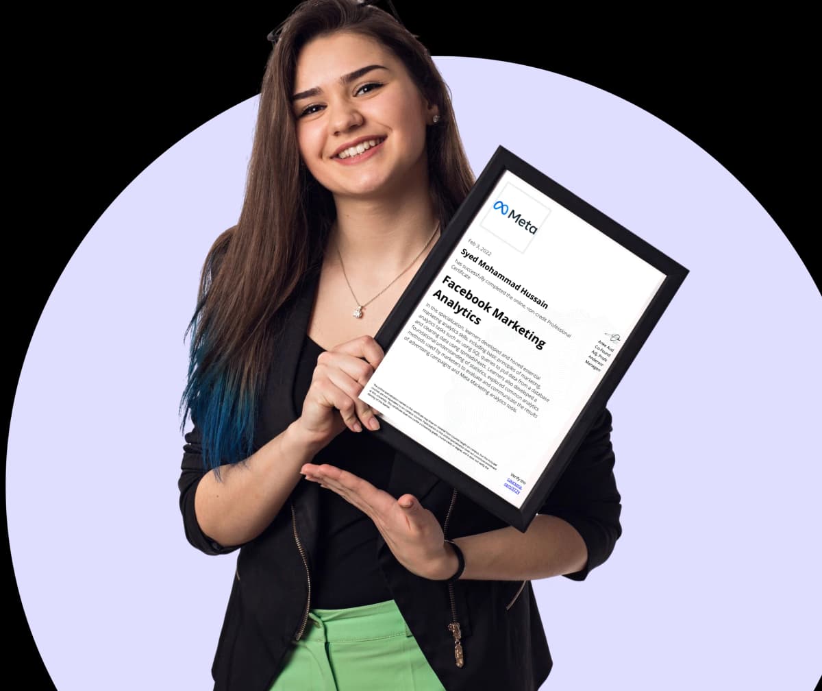 Student holding certificate